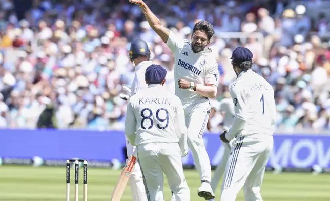 India's Nitish Kumar Reddy celebrates the dismissal of England's Ben Duckett during the third cricket test match between England and India at Lord's cricket ground in London, Thursday, July 10, 2025. (AP Photo/Richard Pelham)