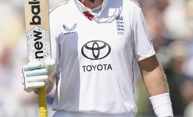 England's Joe Root celebrates after scoring fifty runs during the third cricket test match between England and India at Lord's cricket ground in London, Thursday, July 10, 2025. (AP Photo/Richard Pelham)