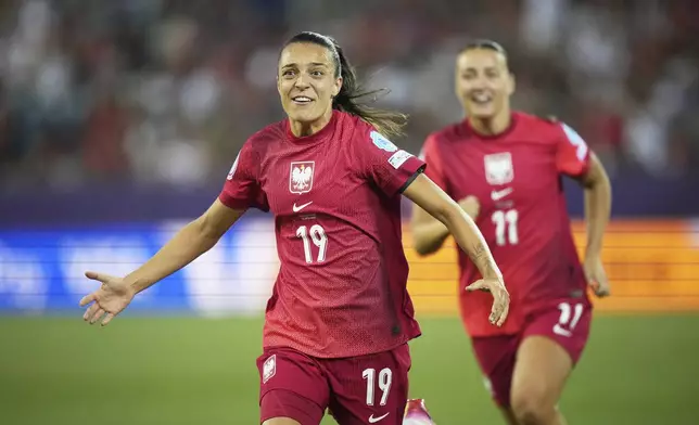 Poland's Natalia Padilla celebrates after scoring her side's opening goal during the Women's Euro 2025, group C, soccer match between Poland and Denmark at Allmend Stadion Luzern in Lucerne, Switzerland, Saturday, July 12, 2025. (AP Photo/Alessandra Tarantino)