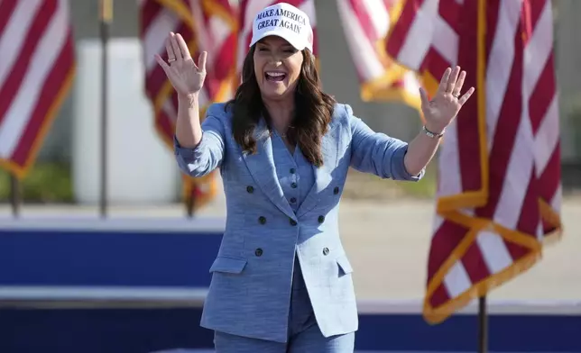 Agriculture Secretary Brooke Rollins arrives before President Donald Trump speaks during a rally, Thursday, July 3, 2025, in Des Moines, Iowa. (AP Photo/Charlie Neibergall)