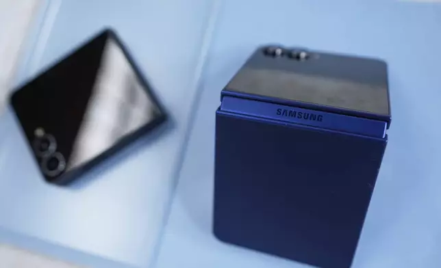 The new Galaxy Z Flip 7 is displayed during a Samsung preview event in New York, Monday, July 7, 2025. (AP Photo/Seth Wenig)