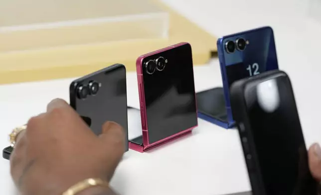 The new Galaxy Z Flip 7 is displayed during a Samsung preview event in New York, Monday, July 7, 2025. (AP Photo/Seth Wenig)