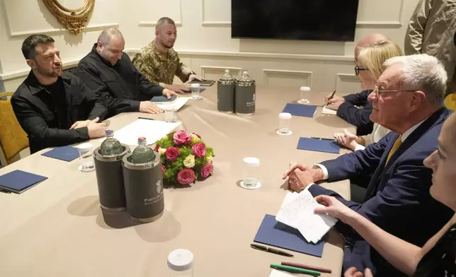 Ukraine's President Volodymyr Zelenskyy, left, meets with United States Special Envoy for Ukraine and Russia, Joseph Keith Kellogg, second right, in Rome, Italy, Wednesday, July 9, 2025. (AP Photo/Gregorio Borgia)