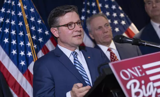 Speaker of the House Mike Johnson, R-La., joined at right by Majority Leader Steve Scalise, R-La., speaks at the Republican National Committee headquarters in Washington, Tuesday, July 15, 2025. (AP Photo/J. Scott Applewhite)