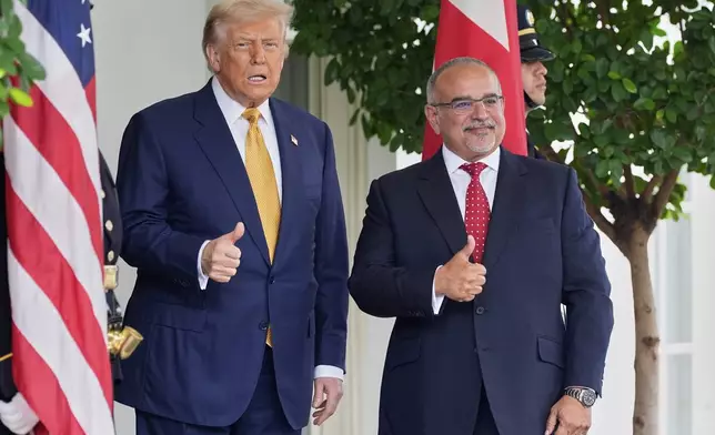 President Donald Trump greets Bahrain's Crown Prince Salman bin Hamad Al Khalifa at the White House, Wednesday, July 16, 2025, in Washington. (AP Photo/Alex Brandon)
