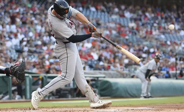 Detroit Tigers' Spencer Torkelson hits a home run during the first inning of a baseball game against the Washington Nationals, Thursday, July 3, 2025, in Washington. (AP Photo/Daniel Kucin Jr.)