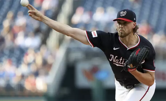 Washington Nationals pitcher Jake Irvin throws during the first inning of a baseball game against the Detroit Tigers, Thursday, July 3, 2025, in Washington. (AP Photo/Daniel Kucin Jr.)