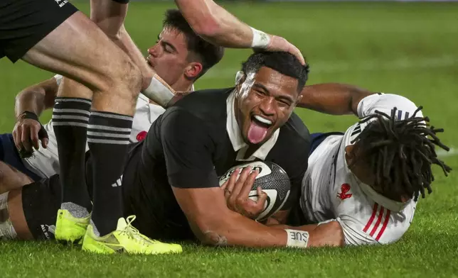 New Zealand's Tupou Vaa'i reacts after scoring a try during the second rugby union international between the All Blacks and France in Wellington, New Zealand, Saturday, July 12, 2025. (Elias Rodriguez/Photosport via AP)