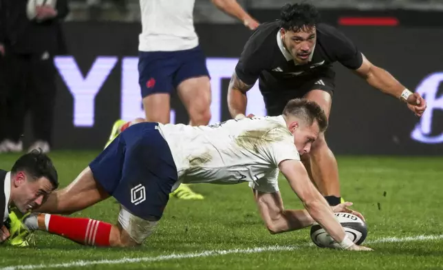 Leo Barre of France scores a try during the second rugby union international between the All Blacks and France in Wellington, New Zealand, Saturday, July 12, 2025. (Elias Rodriguez/Photosport via AP)