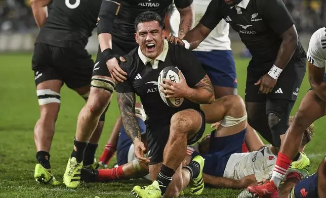 New Zealand's Codie Taylor reacts after scoring a try during the second rugby union international between the All Blacks and France in Wellington, New Zealand, Saturday, July 12, 2025. (Kerry Marshall /Photosport via AP)