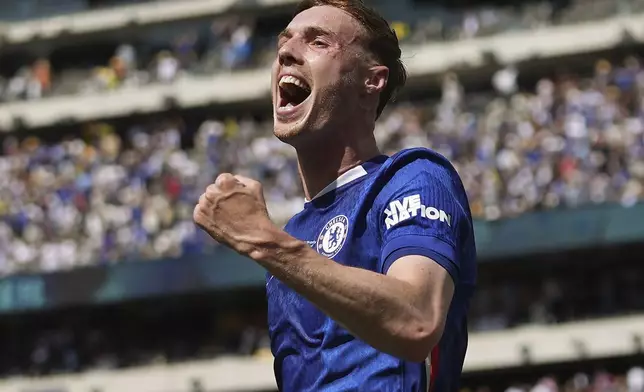 Chelsea's Cole Palmer reacts after scoring a goal against Paris Saint-Germain during the first half of the Club World Cup final soccer match in East Rutherford, N.J., Sunday, July 13, 2025. (AP Photo/Frank Franklin II)