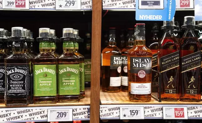 FILE - Bottles of spirits are labeled with a star in Bilka in Randers, Denmark, making it easier for customers to buy European goods, Monday, March 17, 2025. (Bo Amstrup/Ritzau Scanpix via AP, File)