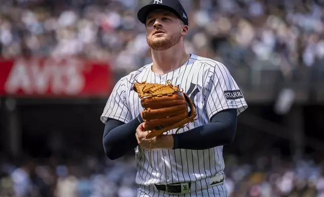 New York Yankees pitcher Clarke Schmidt (36) walks off the field during the fourth inning of a baseball game against the Athletics, Saturday, June 28, 2025, in New York. (AP Photo/Angelina Katsanis)