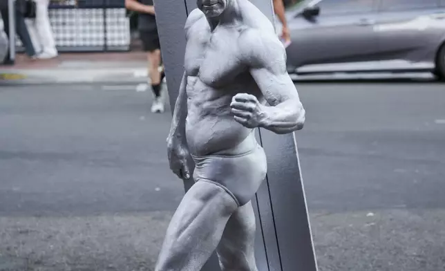 Todd Schmidt of San Diego, Calif. dressed as Silver Surfer from "Fantastic Four" attends Comic-Con International on Thursday, July 24, 2025, in San Diego. (Photo by Andrew Park/Invision/AP)