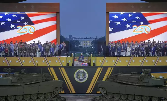 President Donald Trump speaks during a military parade commemorating the Army's 250th anniversary, Saturday, June 14, 2025, in Washington. (AP Photo/Julia Demaree Nikhinson)
