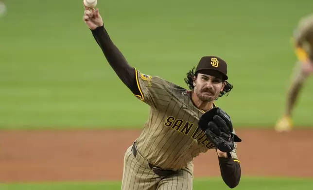 San Diego Padres starting pitcher Dylan Cease throws to the Washington Nationals during the second inning of a baseball game at Nationals Park, Friday, July 18, 2025, in Washington. (AP Photo/Jess Rapfogel)