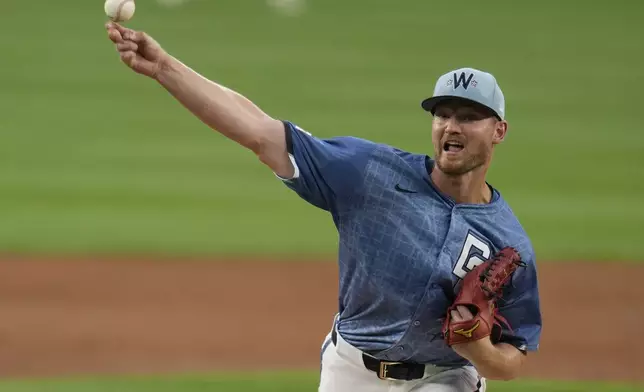 Washington Nationals starting pitcher Michael Soroka throws to the San Diego Padres during the second inning of a baseball game at Nationals Park, Friday, July 18, 2025, in Washington. (AP Photo/Jess Rapfogel)