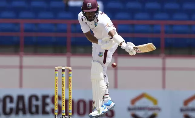 West Indies' Shai Hope plays a shot from a delivery of Australia's captain Pat Cummins on day four of the second cricket Test match at the National Cricket Stadium in St. George's, Grenada, Sunday, July 6, 2025. (AP Photo/Ricardo Mazalan)