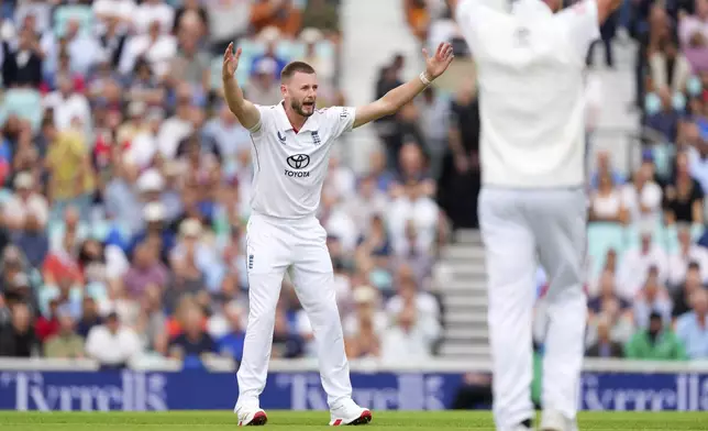 England's Gus Atkinson appeals successfully for the wicket of India's Yashasvi Jaiswal during the first day of the fifth cricket test match between England and India at The Kia Oval in London, Thursday, July 31, 2025. (AP Photo/Kirsty Wigglesworth)