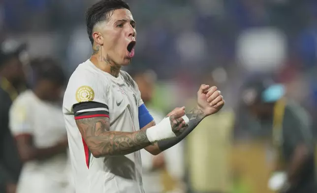 Chelsea's Enzo Fernandez reacts at the end of the Club World Cup quarterfinal soccer match between Palmeiras and Chelsea in Philadelphia, Friday, July 4, 2025. (AP Photo/Chris Szagola)
