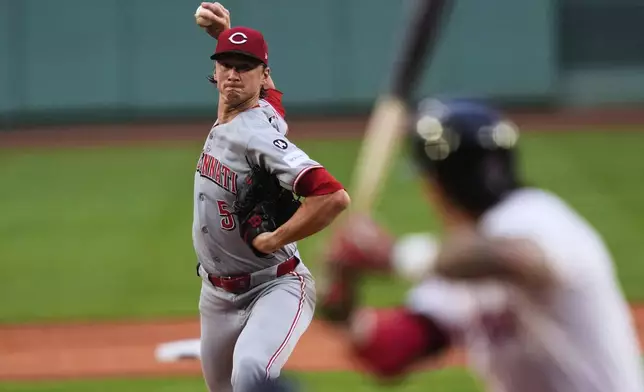 Cincinnati Reds pitcher Brady Singer delivers against the Boston Red Sox during the first inning of a baseball game at Fenway Park, Tuesday, July 1, 2025, in Boston. (AP Photo/Charles Krupa)