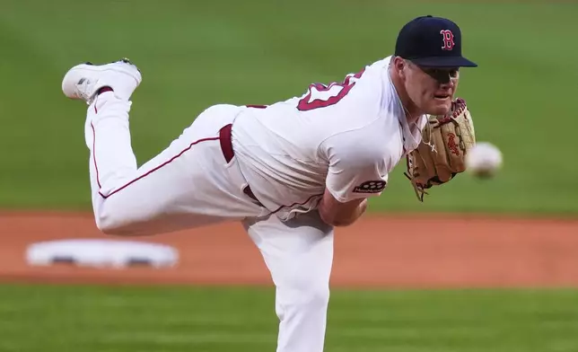 Boston Red Sox pitcher Richard Fitts delivers during the first inning of a baseball game against the Cincinnati Reds at Fenway Park, Tuesday, July 1, 2025, in Boston. (AP Photo/Charles Krupa)