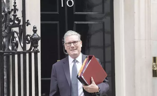 Britain Prime Minister Keir Starmer departs 10 Downing Street, London, to attend Prime Minister's Questions at the Houses of Parliament, Wednesday July 16, 2025. (Stefan Rousseau/PA via AP)