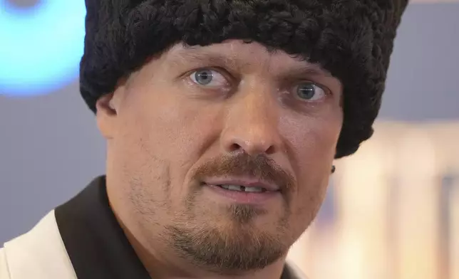Ukraine's boxer Oleksandr Usyk attends a press conference in Wembley stadium in London, Thursday, July 17, 2025, ahead of the boxing fight between Britain's Daniel Dubois and Oleksandr Usyk on Saturday. (AP Photo/Kin Cheung)