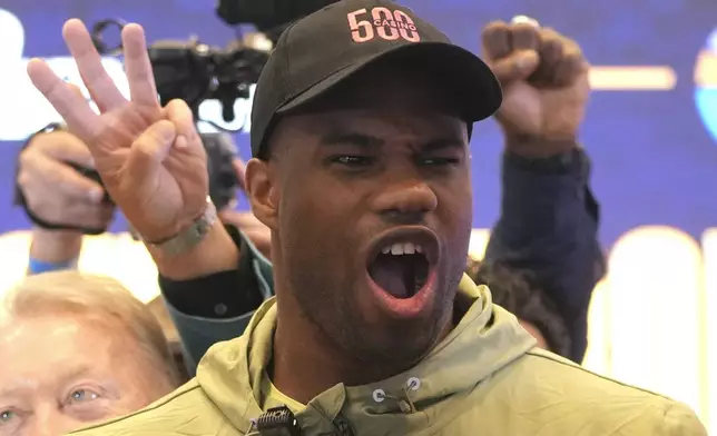 Britain's Daniel Dubois attends a press conference in Wembley stadium in London, Thursday, July 17, 2025, ahead of the boxing fight between Britain's Daniel Dubois and Ukraine's boxer Oleksandr Usyk on Saturday. (AP Photo/Kin Cheung)