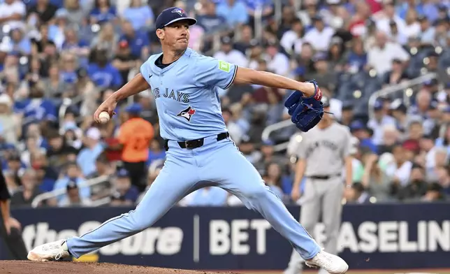 Toronto Blue Jays starting pitcher Chris Bassitt (40) throws to a New York Yankees batter in first inning of a baseball game in Toronto on Wednesday, July 23, 2025. (Jon Blacker/The Canadian Press via AP)