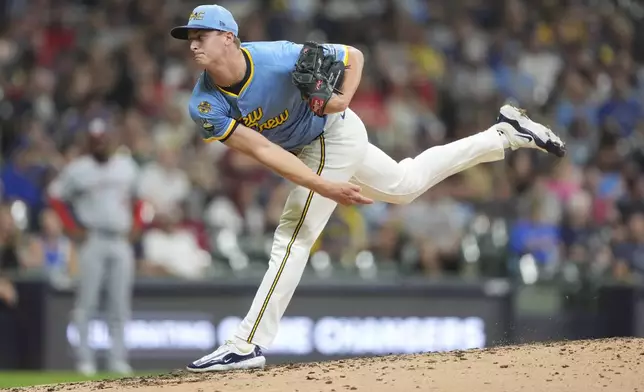 Milwaukee Brewers' Quinn Priester pitches during the fifth inning of a baseball game against the Washington Nationals, Friday, July 11, 2025, in Milwaukee. (AP Photo/Aaron Gash)