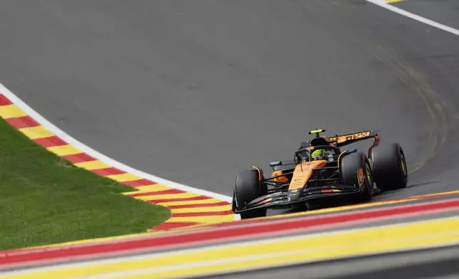 McLaren driver Lando Norris of Britain steers his car during qualification ahead of the Formula One Grand Prix at the Spa-Francorchamps racetrack in Spa, Belgium, Saturday, July 26, 2025. (AP Photo/Geert Vanden Wijngaert)