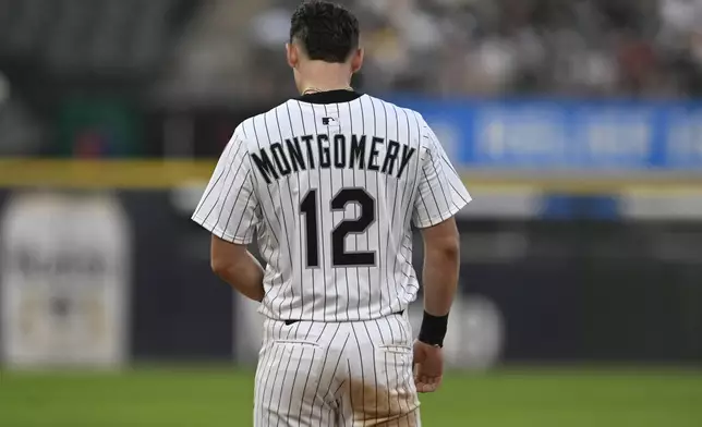 Chicago White Sox's Colson Montgomery (12) looks on after flying out during the fourth inning of a baseball game against the Toronto Blue Jays, Monday, July 7, 2025, in Chicago. (AP Photo/Paul Beaty)