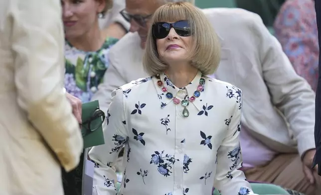 Anna Wintour sits in the Royal Box on Centre Court on day twelve at the Wimbledon Tennis Championships in London, Friday, July 11, 2025. (AP Photo/Kin Cheung)