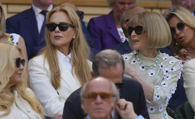 Anna Wintour and actor Nicole Kidman sit in the Royal Box to watch Veronika Kudermetova of Russia and Elise Mertens of Belgium against Jelena Ostapenko of Latvia and Su-Weih Hsieh of Taiwan during the women's doubles final match at the Wimbledon Tennis Championships in London, Sunday, July 13, 2025.(AP Photo/Kirsty Wigglesworth)