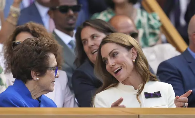 Britain's Kate, Princess of Wales sits next to tennis legend Billie Jean King in the Royal Box on Centre Court ahead of the women's singles final at the Wimbledon Tennis Championships in London, Saturday, July 12, 2025. (AP Photo/Kin Cheung)