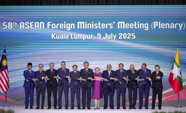 From left to right, Indonesia's Foreign Minister Sugiono, Lao Minister for Foreign Affairs Thongsavanh Phomvihane, Singapore's Foreign Minister Vivian Balakrishnan, Thailand's Foreign Minister Maris Sangiampongsa, Vietnam's Foreign Minister Bui Thanh Son, Malaysia's Foreign Affairs Minister Mohamad Hasan, Philippine Foreign Secretary Theresa Lazaro, Brunei's Minister of Foreign Affairs Erywan Yusof, Cambodia's Foreign Minister Prak Sokhonn, Myanmar Ministry of Foreign Affairs representative Kyaw Nyun Oo, East Timor Foreign Minister Bendito dos Santos Freitas and ASEAN's Secretary-General Kao Kim Hourn pose for a group photo during a plenary session of the Association of Southeast Asian Nations (ASEAN) Foreign Ministers' meeting at the Convention Centre in Kuala Lumpur Malaysia, Wednesday, July 9, 2025. (AP Photo/Vincent Thian)