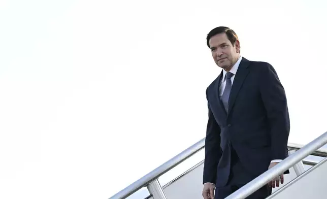 U.S. Secretary of State Marco Rubio disembarks upon his arrival at Subang Air Base, outside of Kuala Lumpur Thursday, July 10, 2025. Rubio arrived in Malaysia to attend the ASEAN Foreign Ministers' Meeting. (Mandel Ngan/Pool Photo via AP)