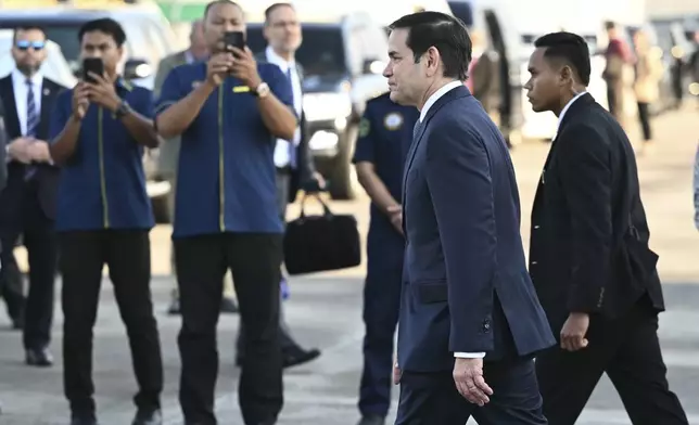 U.S. Secretary of State Marco Rubio, front, arrives at Subang Air Base, outside of Kuala Lumpur Thursday, July 10, 2025. Rubio arrived in Malaysia to attend the ASEAN Foreign Ministers' Meeting. (Mandel Ngan/Pool Photo via AP)