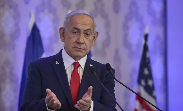Israeli Prime Minister Benjamin Netanyahu speaks to the audience at a conference in Jerusalem, Sunday, July 27, 2025. (AP Photo/Ohad Zwigenberg)