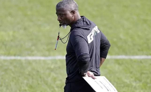 New York Jets head coach Aaron Glenn looks on during an NFL football training camp, Wednesday, July 23, 2025, in Florham Park, N.J. (AP Photo/Adam Hunger)