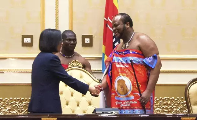 FILE - Taiwan's President Tsai Ing-wen, left, shakes hands with Eswatini's King Mswati III at the royal palace in Ludzidzini, Eswatini Tuesday, Sept. 5, 2023. (AP Photo, file)