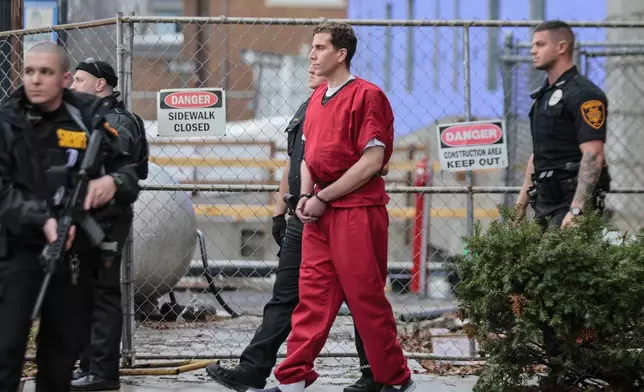 FILE - Bryan Kohberger, facing first-degree murder charges in the deaths of four University of Idaho students last fall, is taken by sheriff's deputies from the Monroe County Courthouse in Stroudsburg, Pa., Tuesday, Jan. 3, 2023. (Steven M. Falk/The Philadelphia Inquirer via AP, File)
