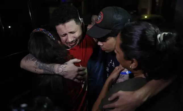 Arturo Suárez, one of the Venezuelan migrants deported months ago to El Salvador by the United States under the Trump administration's immigration crackdown, is welcomed home by his relatives in Caracas, Venezuela, Tuesday, July 22, 2025. (AP Photo/Cristian Hernandez)