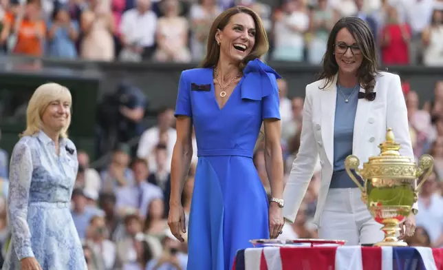 Britain's Kate, Princess of Wales, arrives to hand the trophy to Jannik Sinner of Italy after winning the men's singles final match against Carlos Alcaraz of Spain at the Wimbledon Tennis Championships in London, Sunday, July 13, 2025.(AP Photo/Kirsty Wigglesworth)
