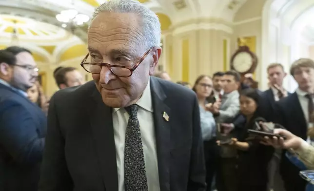Senate Minority Leader Chuck Schumer, D-N.Y., speaks to reporters outside the Senate chamber as Republicans begin a final push to advance President Donald Trump's tax breaks and spending cuts package, at the Capitol in Washington, Monday, June 30, 2025. (AP Photo/Manuel Balce Ceneta)