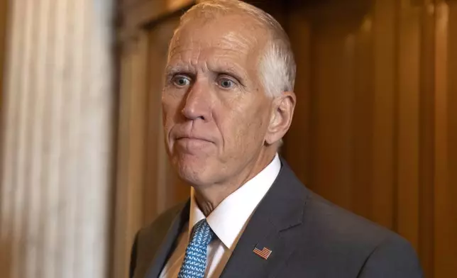 Sen. Thomas Tillis, R-N.C., speaks to reporters as Republicans begin a final push to advance President Donald Trump's tax breaks and spending cuts package, at the Capitol in Washington, Monday, June 30, 2025. (AP Photo/Mark Schiefelbein)
