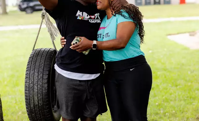 Adrienne Hazel, right, hugs her son Ricky on Thursday, July 17, 2025, in Southfield, Mich. (AP Photo/Sylvia Jarrus)