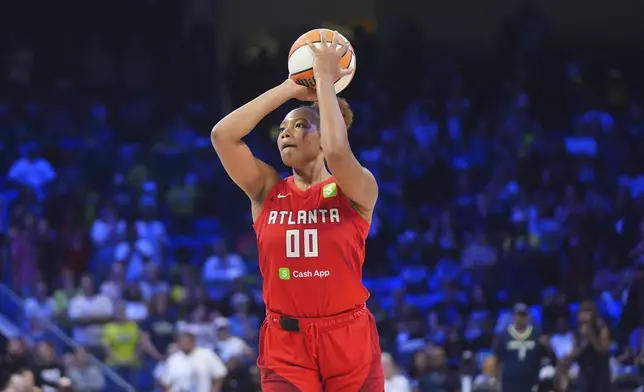 Atlanta Dream forward Naz Hillmon lines up to shoot a game winning shot during the second half of a WNBA basketball game against the Dallas Wings in Arlington, Texas, Wednesday, July 30, 2025. (AP Photo/LM Otero)