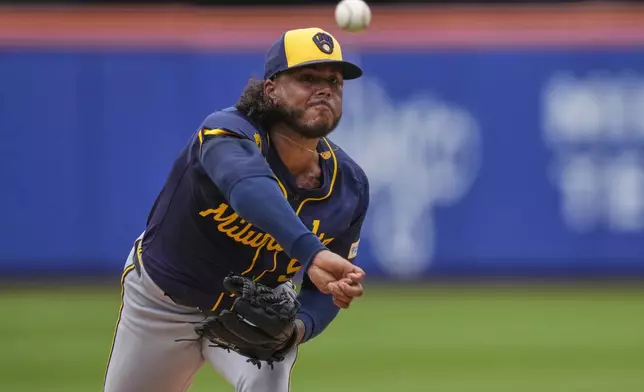 Milwaukee Brewers' Freddy Peralta pitches during the second inning in the first baseball game of a doubleheader against the New York Mets Wednesday, July 2, 2025, in New York. (AP Photo/Frank Franklin II)
